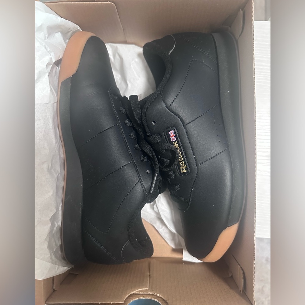 Reebok women’s Black and Tan Sneakers